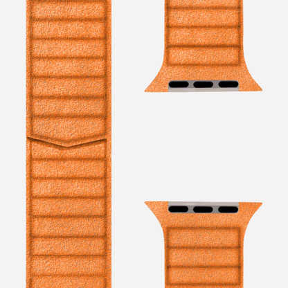 Leuchtend oranges Apple Watch Armband aus Alcantara von bandkult – sportlich, auffällig & angenehm zu tragen.